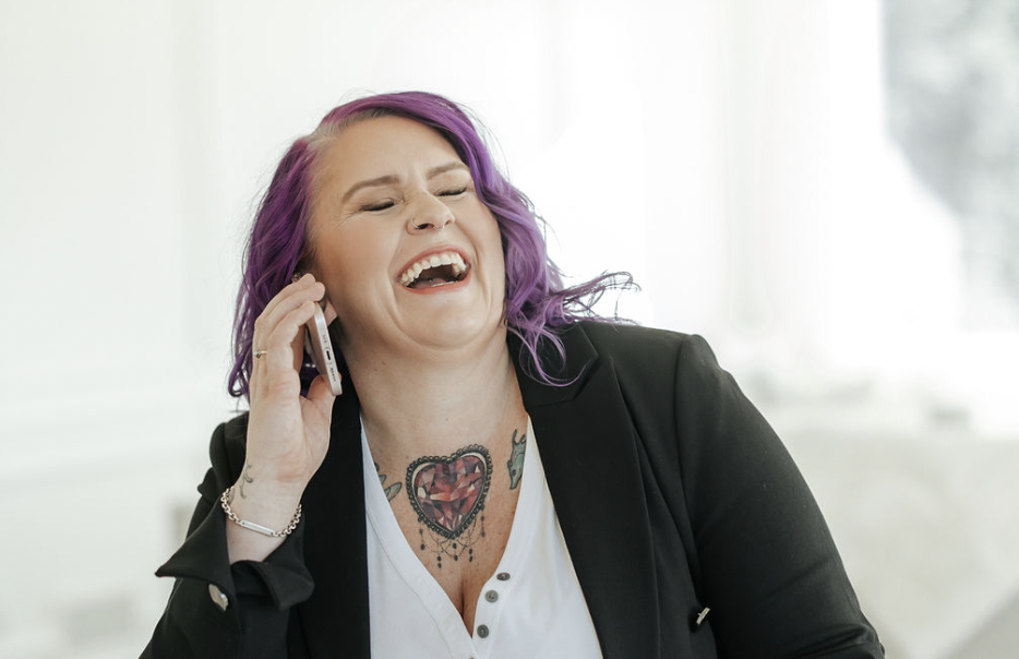 Robyn laughing at her realtor branding photoshoot