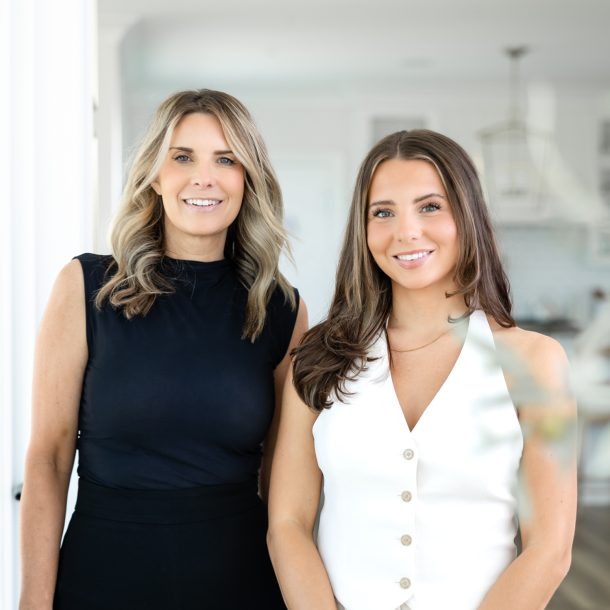 Taylor and Michelle Bercic, dynamic mother-daughter realtor duo, captured in a professional portrait session