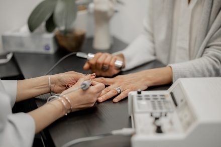 Naturopath consulting with a client in a tranquil Vancouver clinic, capturing personalized care and expertise.