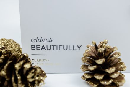 A selection of luxury skincare products arranged neatly on a crisp white background, highlighting their clean and professional design