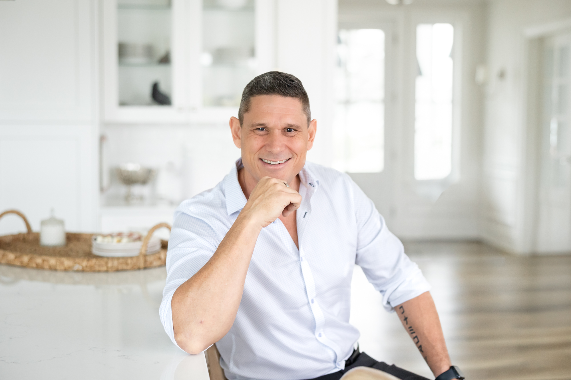 Lifestyle headshot of male realtor