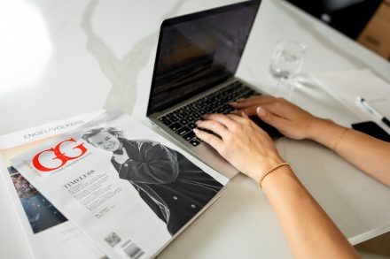Close-up filler image of a realtor’s hands typing on a laptop in private Langley home